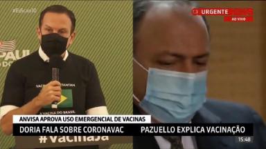 Reprodução de tela dividida da GloboNews com João Dória e general Pazuello 