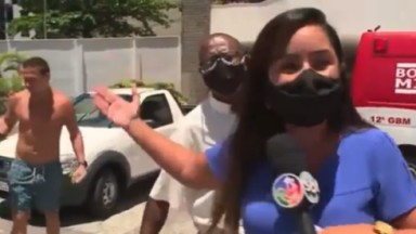 Driele Veiga, repórter do SBT, bate boca com morador de edifício que tentou expulsá-la do local em cobertura de incêncio 