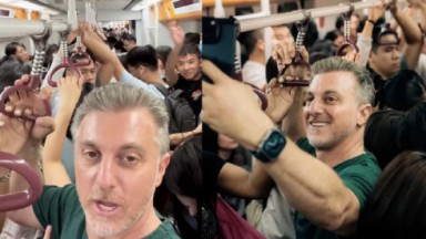 Luciano Huck em metrô lotado na China 