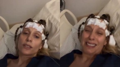 Luísa Mell chorando, deitada em cama de hospital, com aparelhos ligados a sua cabeça 