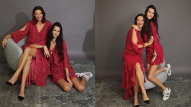 Márcia e Valentina Boscardin posando para fotos com vestidos vermelhos 