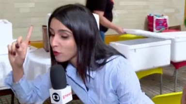 A repórter Fernanda Elnour durante reportagem no SP1 
