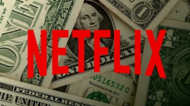 Netflix com o logo e dinheiro atrás 