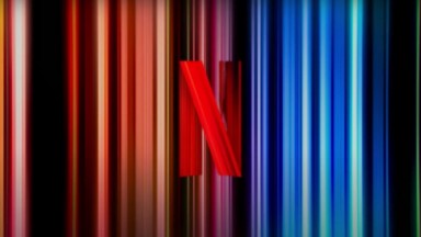 Logo da Netflix com N colorido ao fundo 