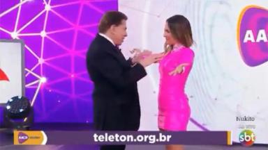 O apresentador Silvio Santos e Claudia Leitte 