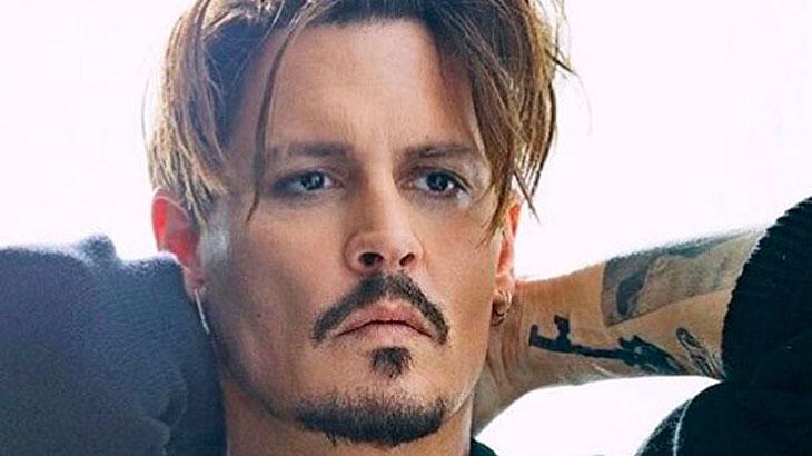 Johnny Depp confessa que deu \"cabeçada\" em sua ex, Amber Heard