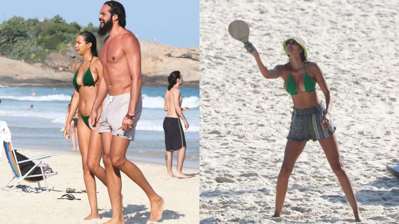 Laís Ribeiro e marido caminhando na praia e ela jogando frescobol