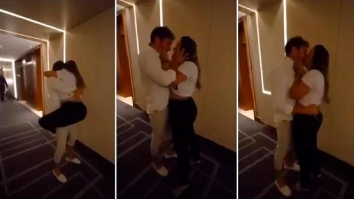 Sequência de fotos mostra Caio abraçando e beijando a esposa no corredor do hotel