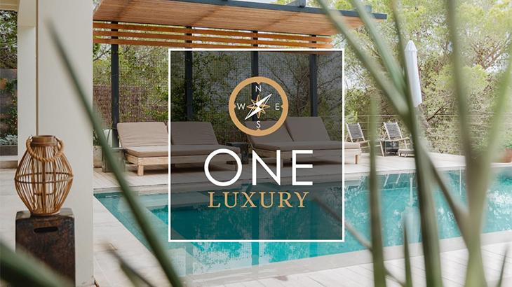 Logo da One Luxury